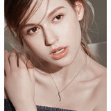 Collier Croix Femme<br> Diamant Noir et Blanc
